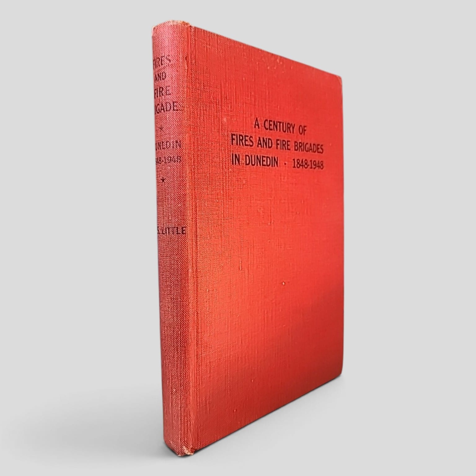 A Century of Fires and Fire Brigades in Dunedin 1848–1948 by J. S. Little – red cloth cover