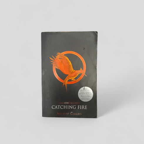 Catching Fire by Suzanne Collins - Books Worth Keeping