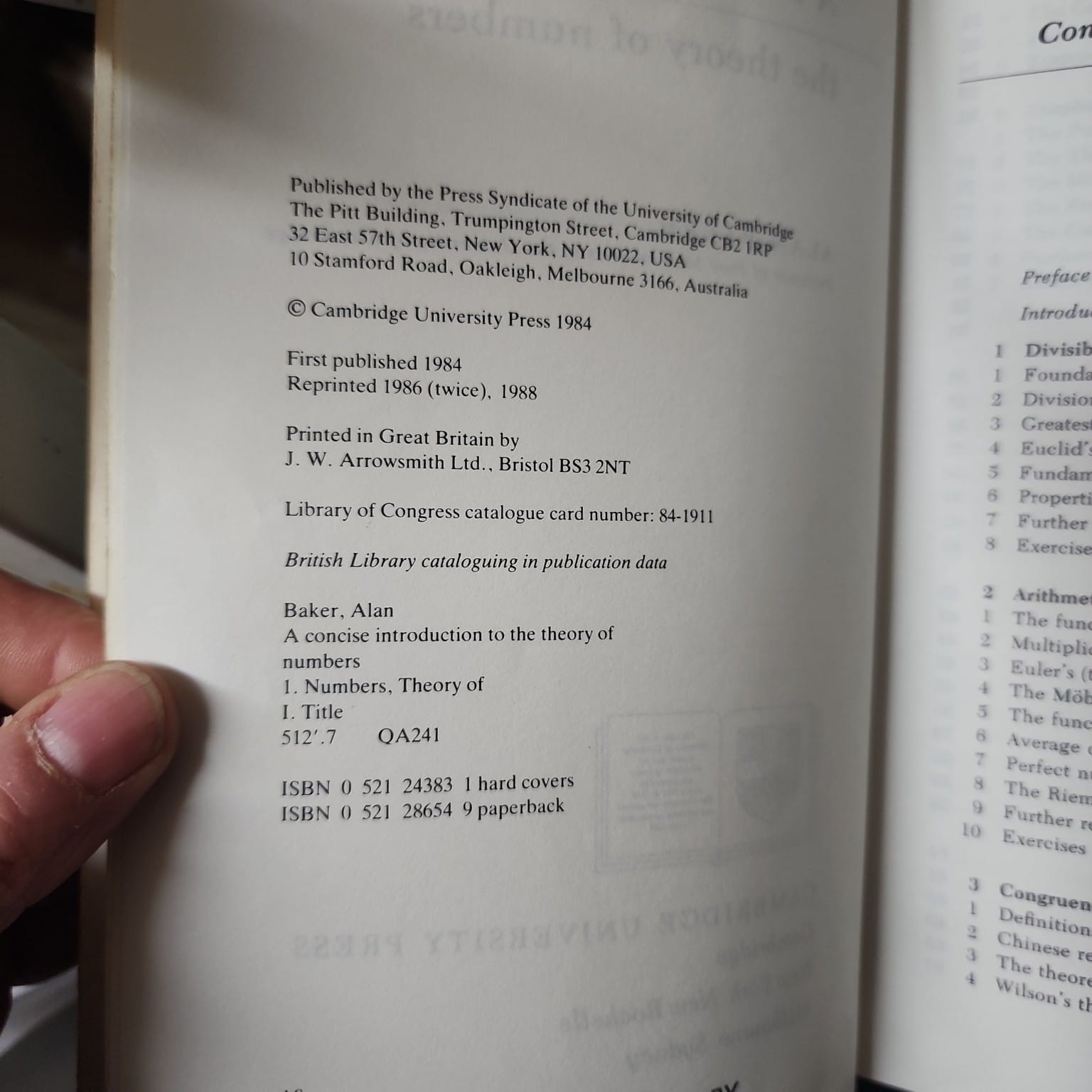 Copyright page of A Concise Introduction to the Theory of Numbers showing the 1988 reprint and ISBN