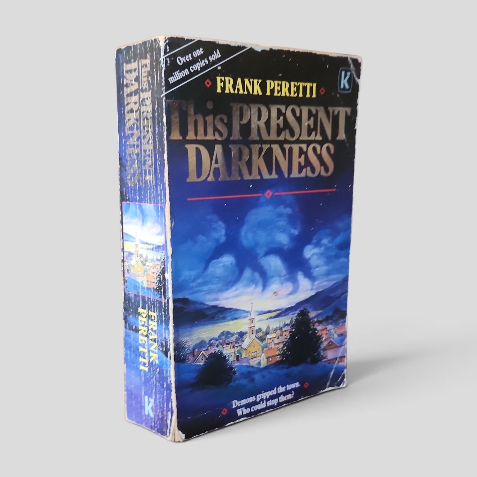 This Present Darkness by Frank Peretti front cover