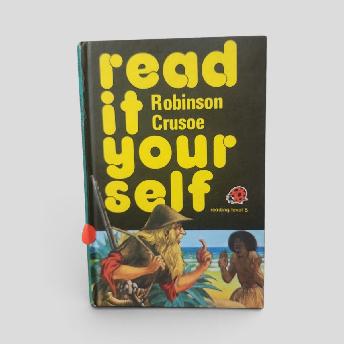 Robinson Crusoe (Ladybird Read It Yourself, Level 5) by Fran Hunia — front cover