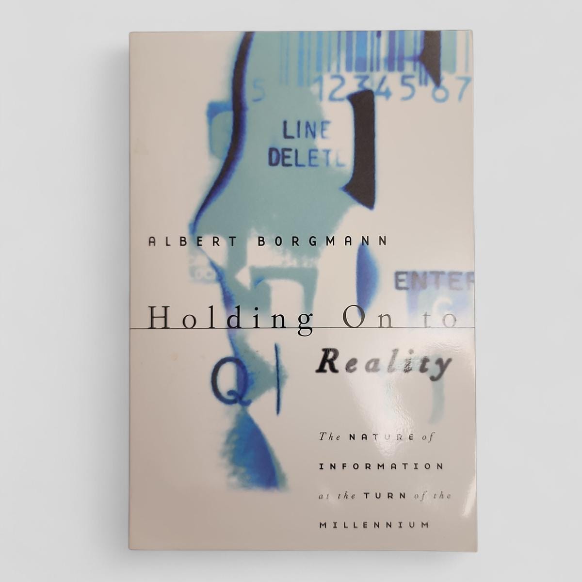 Holding On to Reality by Albert Borgmann - book cover