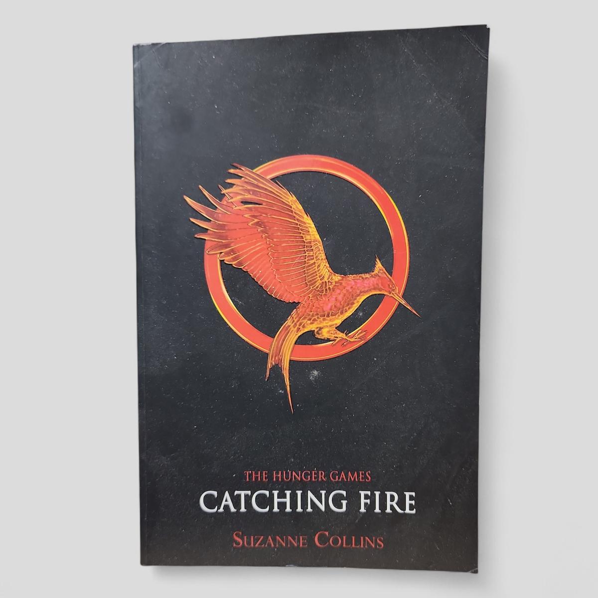 Catching Fire by Suzanne Collins - book cover
