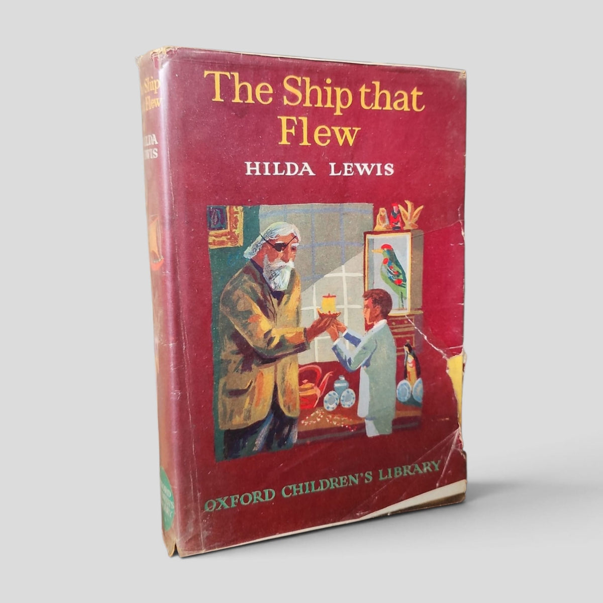 Front cover of The Ship that Flew by Hilda Lewis — actual used copy.