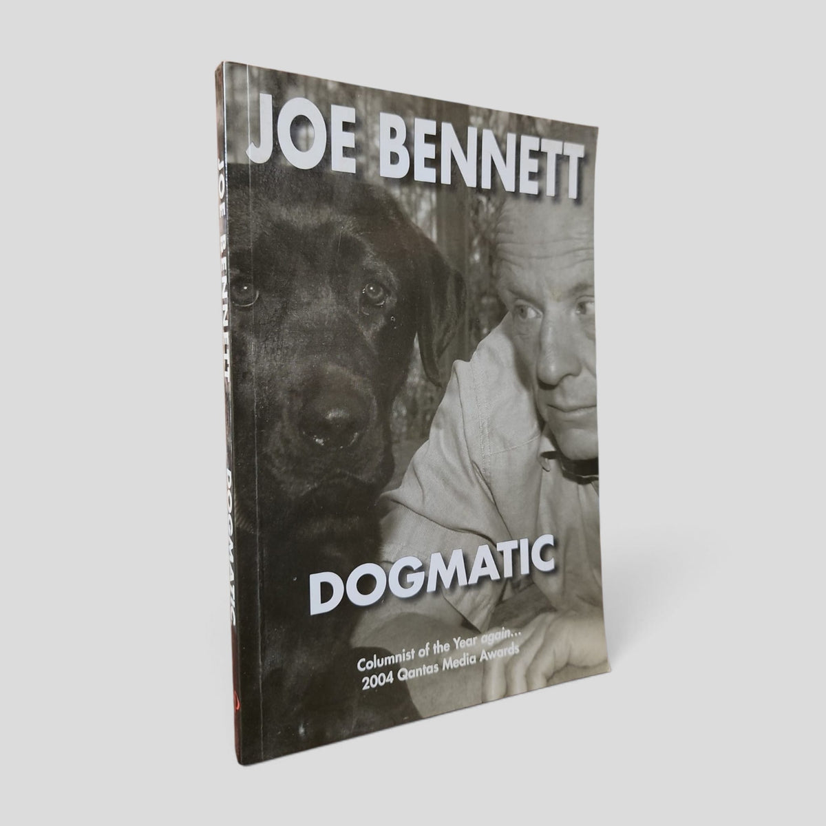 Front cover of Dogmatic by Joe Bennett — actual used copy.