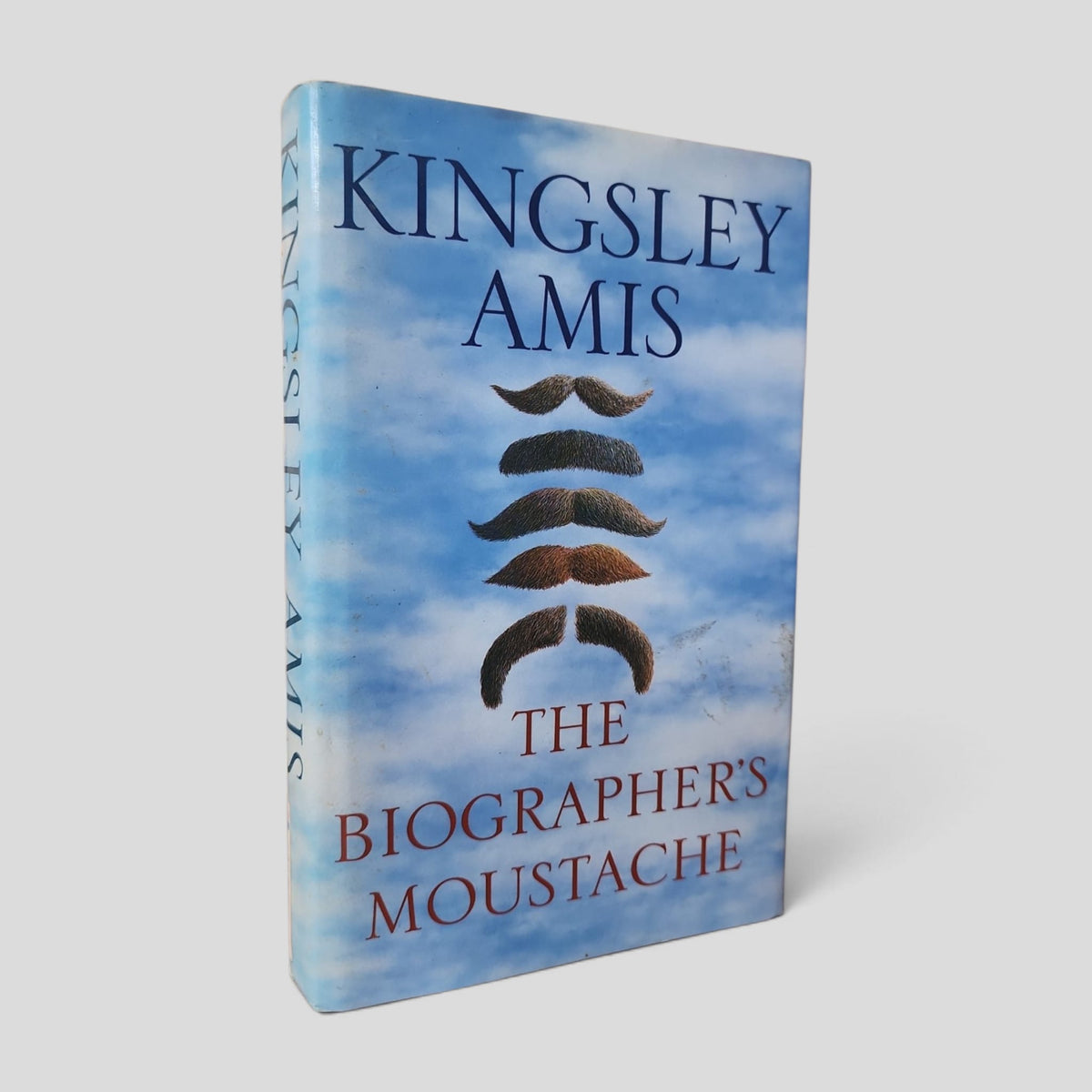 Front cover of The Biographer's Moustache by Kingsley Amis — actual used copy.