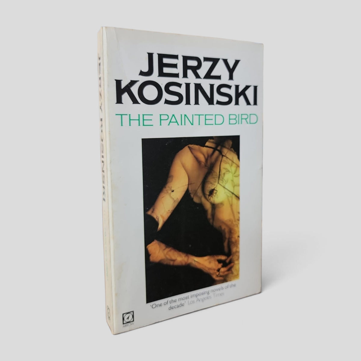 Front cover of The Painted Bird by Jerzy Kosinski — actual used copy.