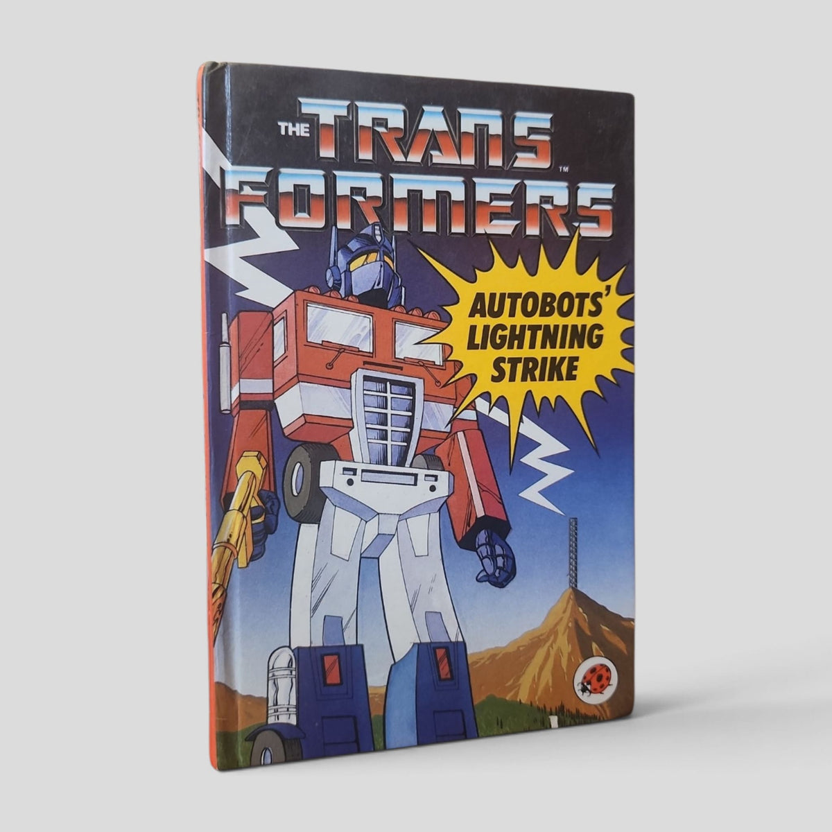 The Transformers: Autobots' Lightning Strike by John Grant – front cover