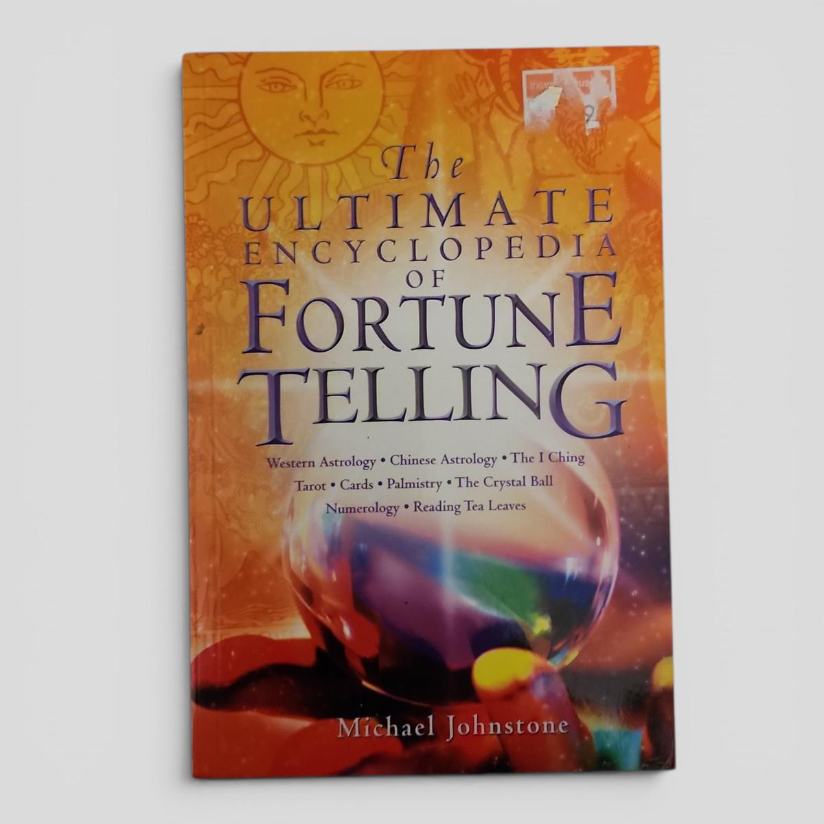 The Ultimate Encyclopedia of Fortune Telling by Michael Johnstone - book cover
