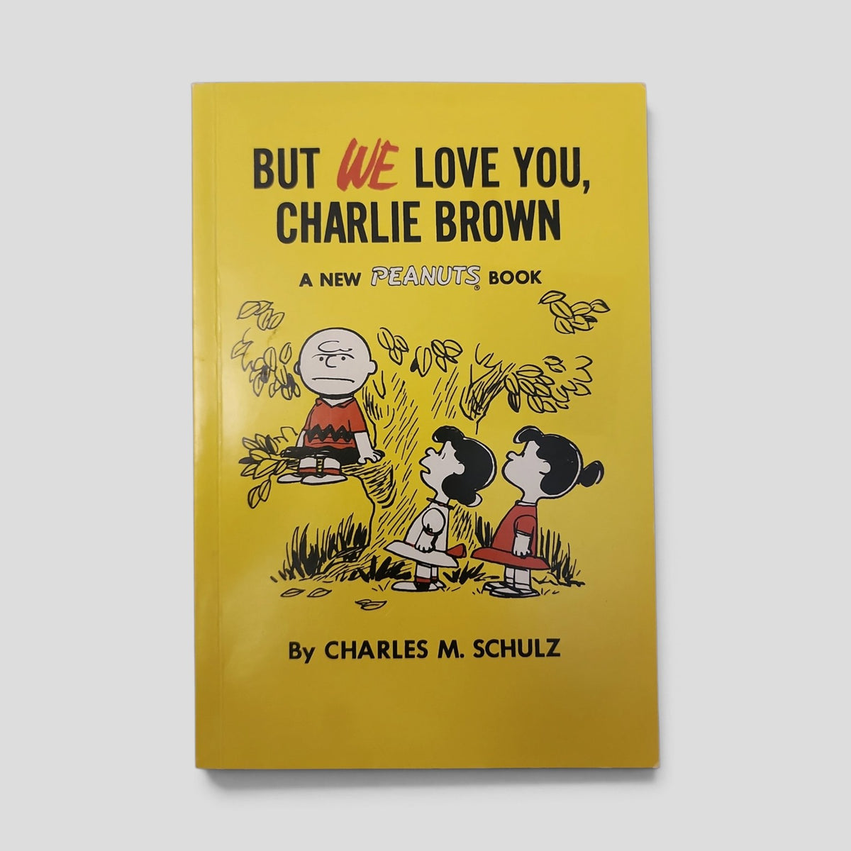 But We Love You, Charlie Brown by Charles M. Schulz