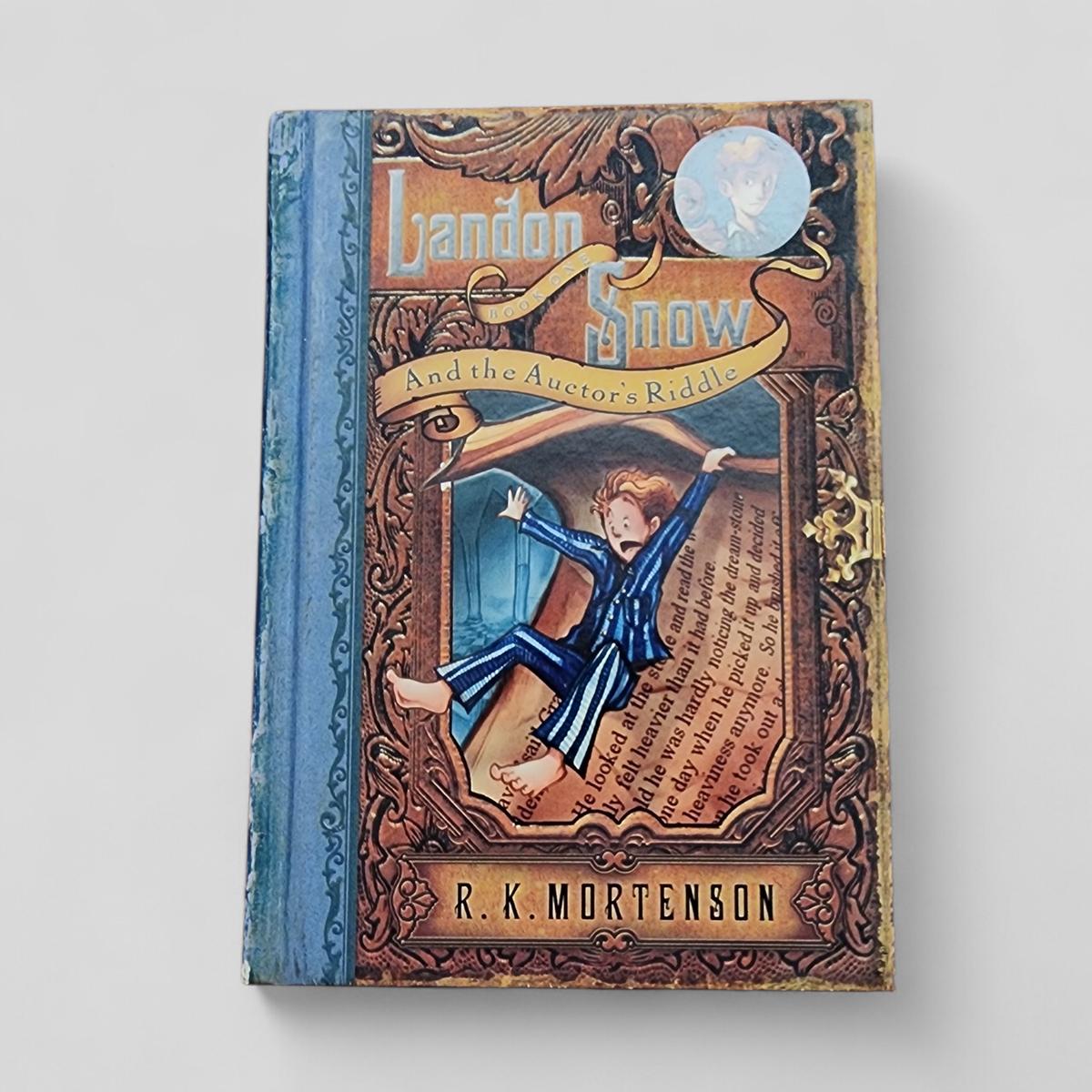 Landon Snow and the Auctor's Riddle by R.K. Mortenson - book cover
