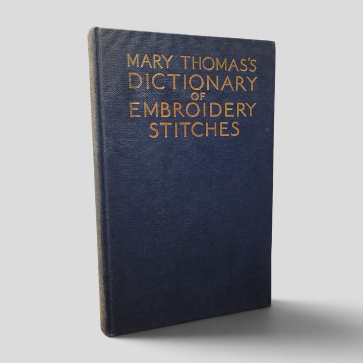 Mary Thomas’s Dictionary of Embroidery Stitches by Mary Thomas — actual used copy, front cover