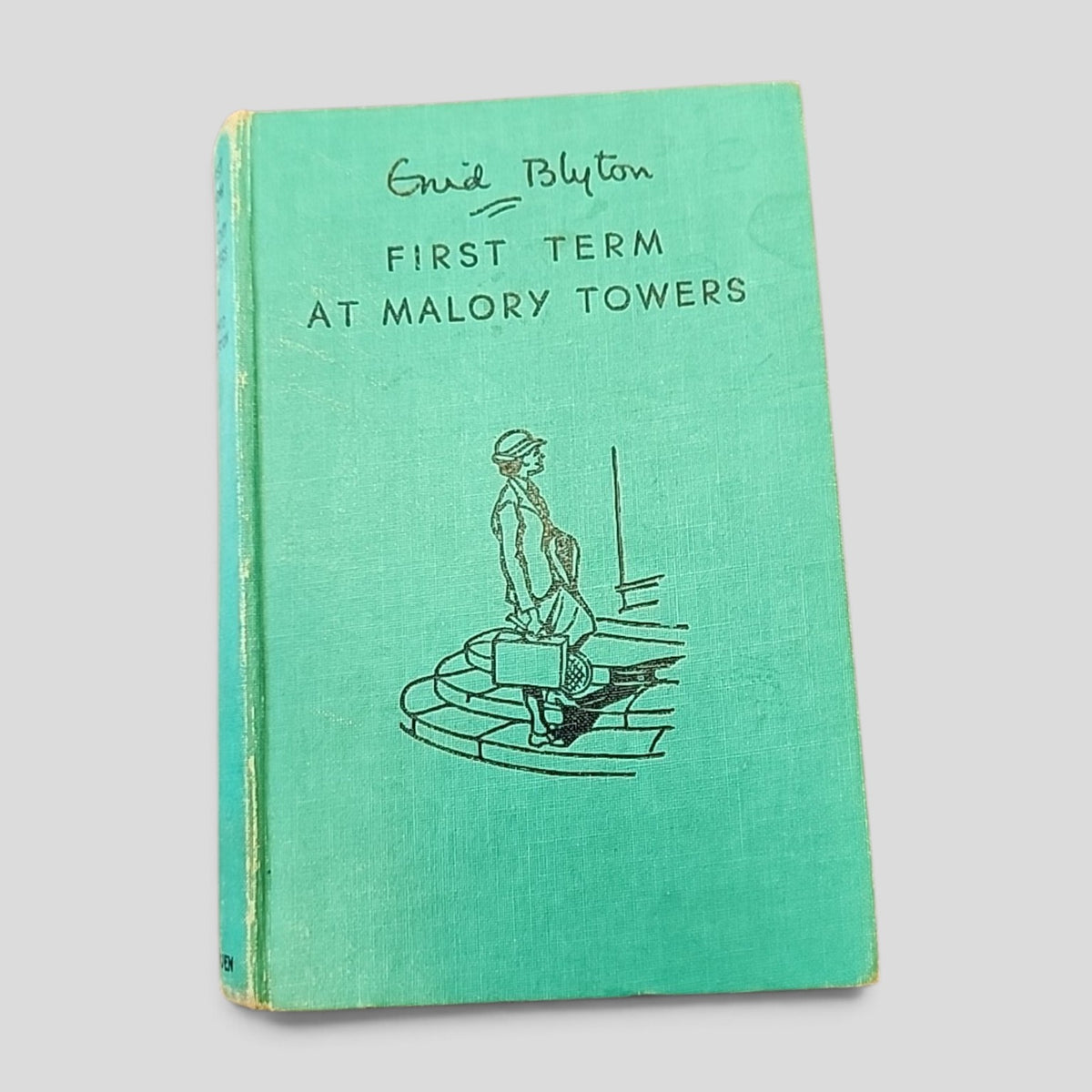 First Term at Malory Towers by Enid Blyton, 1950 fifth edition green cloth hardcover