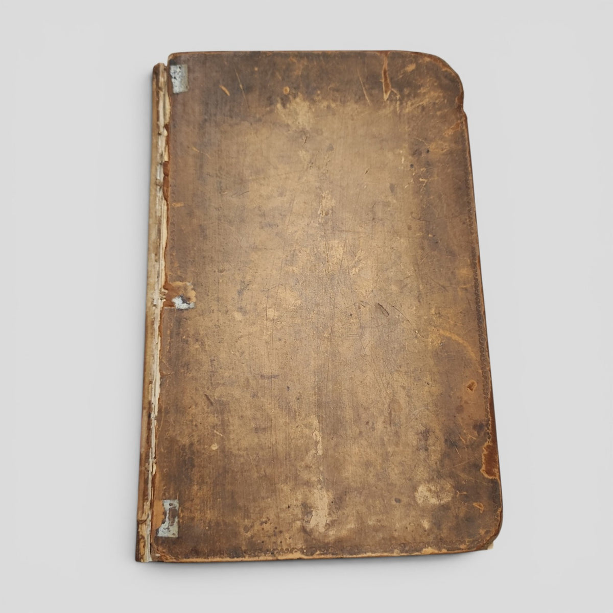 Antique leather cover of The Housekeeper's Instructor, seventeenth edition