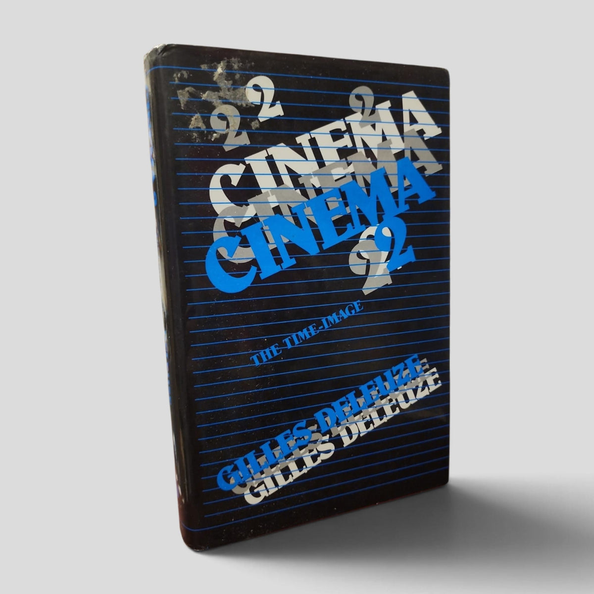 Front cover of Cinema 2: The Time-Image by Gilles Deleuze, Athlone Press hardback with worn dust jacket