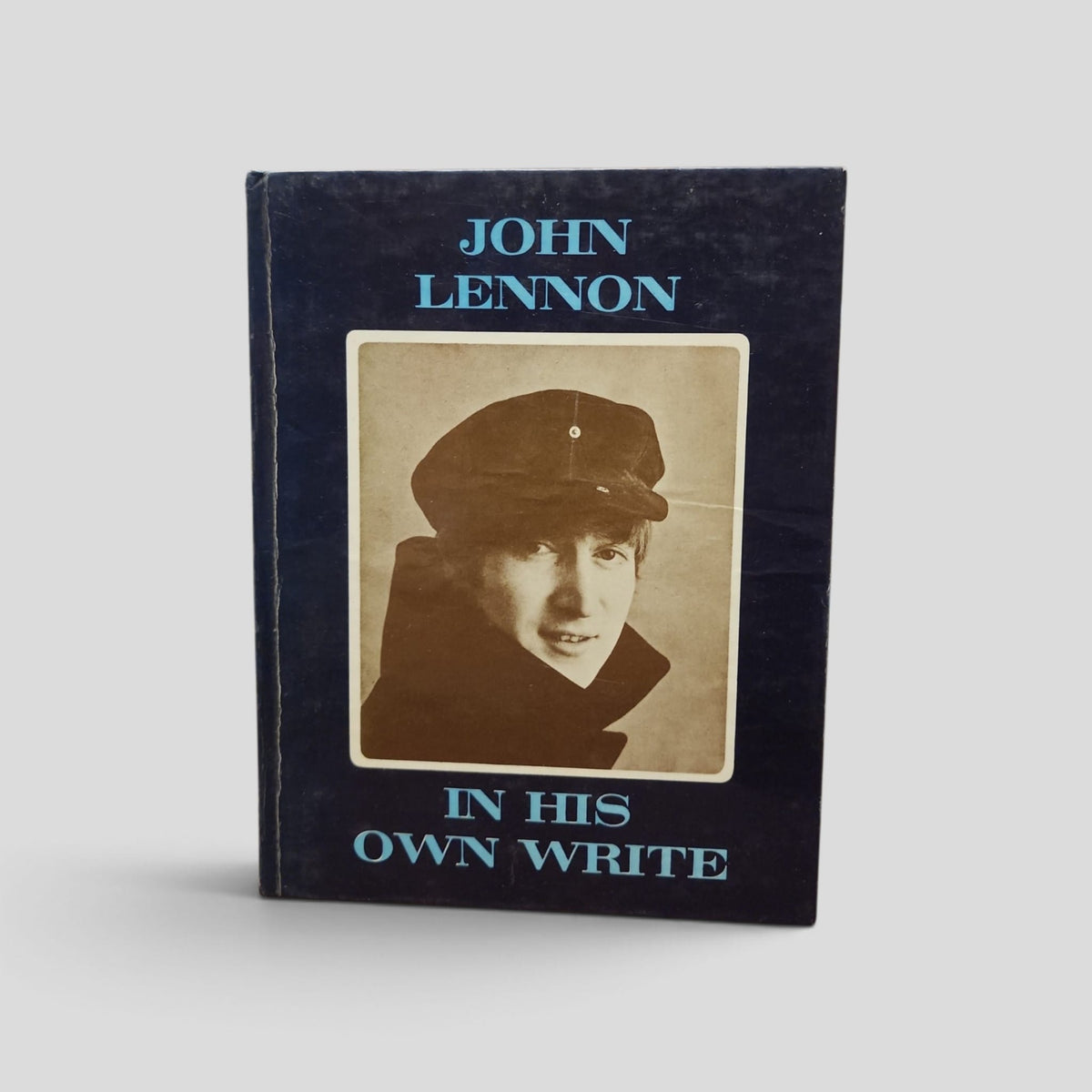 In His Own Write, December 1964 reprint; seventh printing, actual used copy front cover