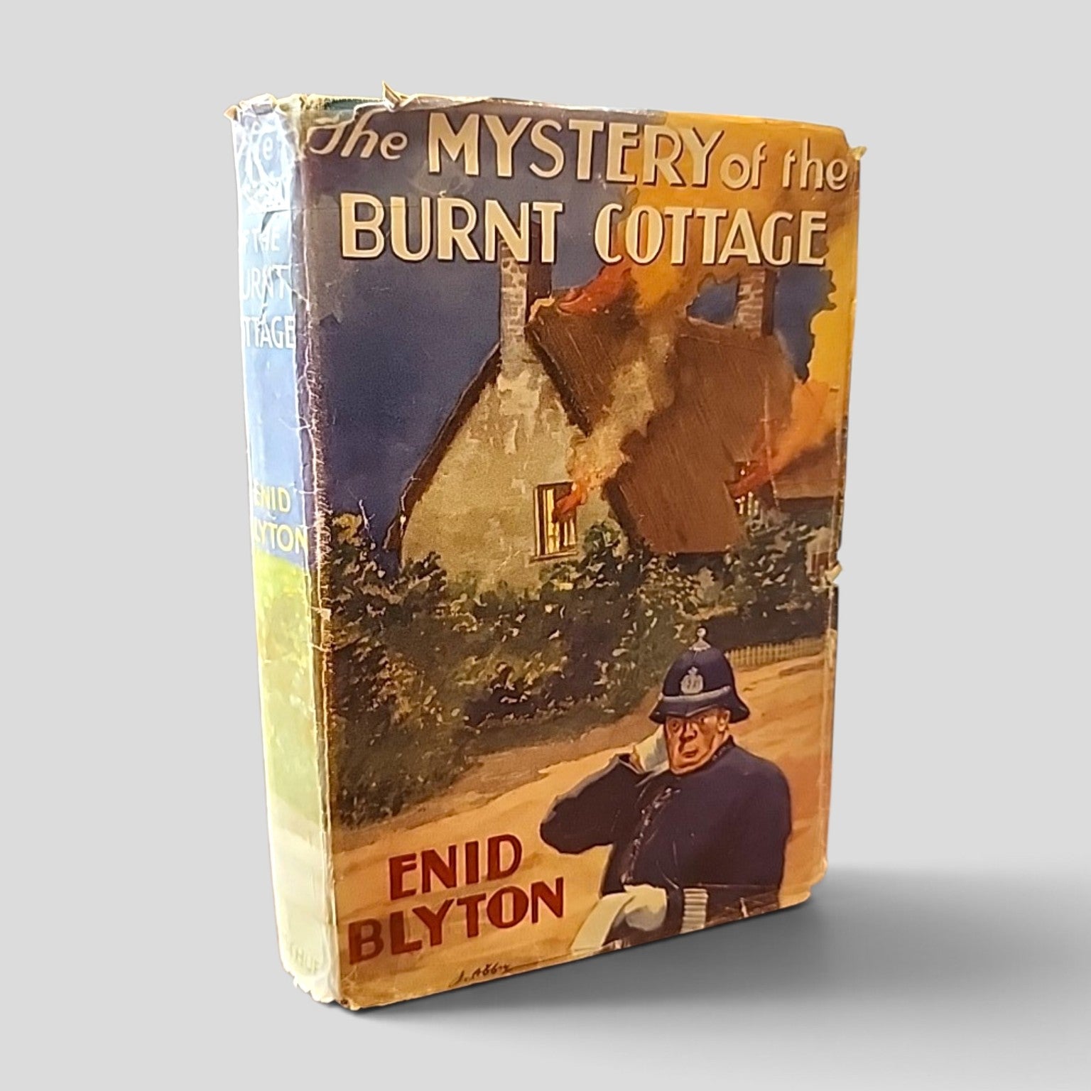 The Mystery of the Burnt Cottage by Enid Blyton, 1950 seventh edition hardcover with dust jacket