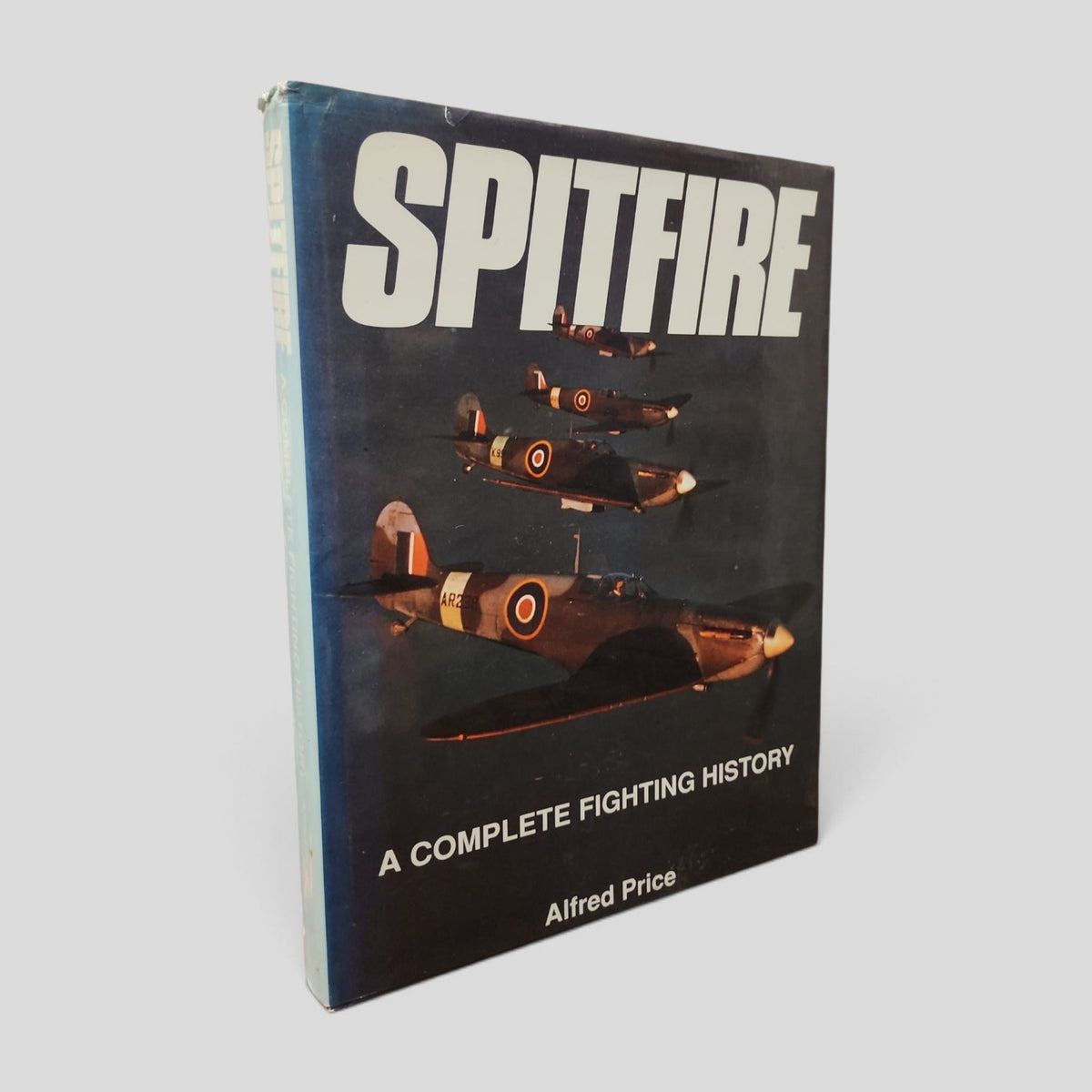 Spitfire: A Complete Fighting History — actual used hardcover at LOC022