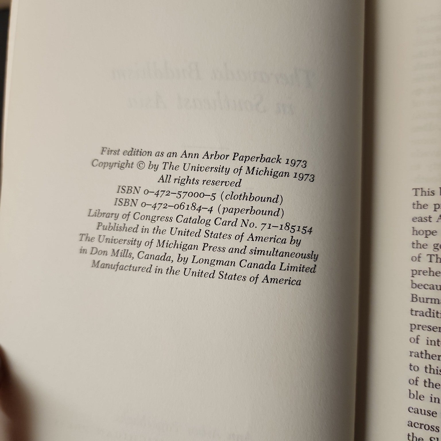 Theravada Buddhism in Southeast Asia copyright page showing 1973 first Ann Arbor paperback edition and ISBN 0472061844