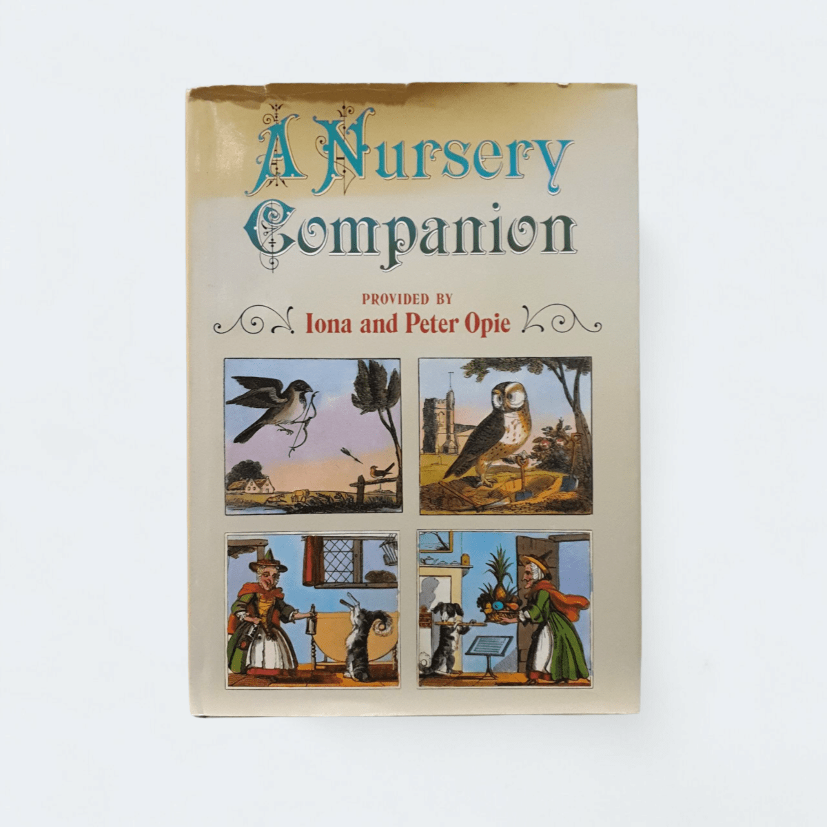 Vintage "A Nursery Companion" Hardcover Book with Colorful Illustrations - Books Worth Keeping